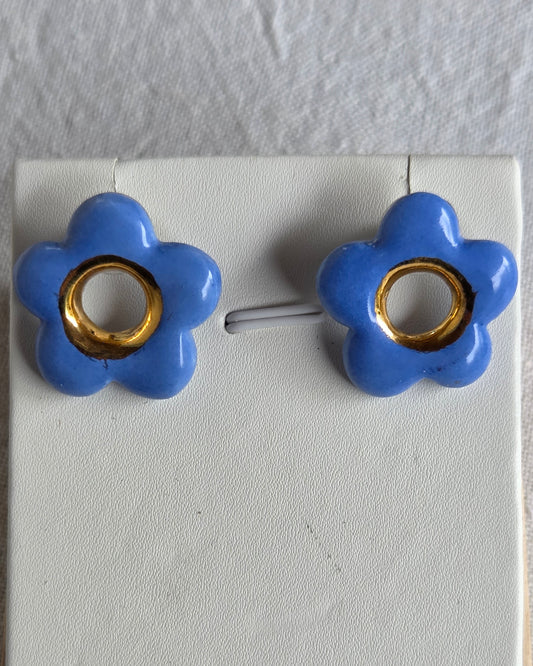 Aros flor azul con lustre de oro