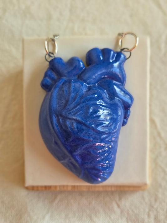Corazón de pared azul cadena