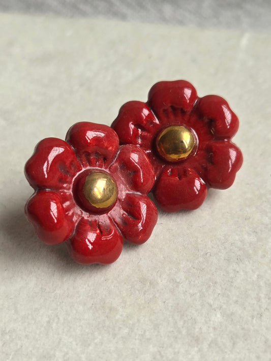 Aros flor terracota con oro 1 pieza