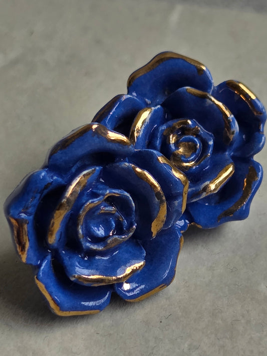 Aros Rosas azules 1 pieza con oro