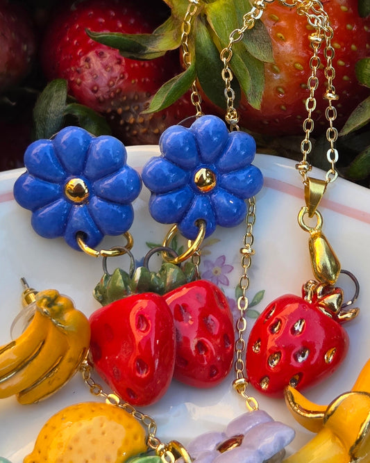 Aros 2 piezas frutillas con oro
