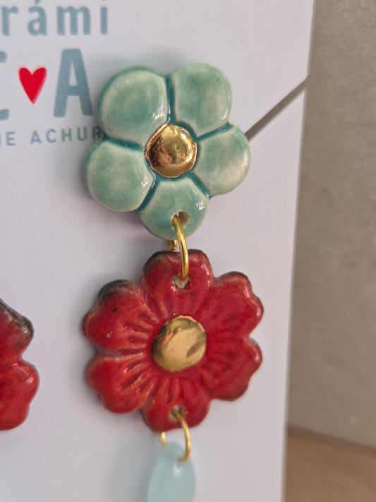 Aros flor rojo y turquesa con oro