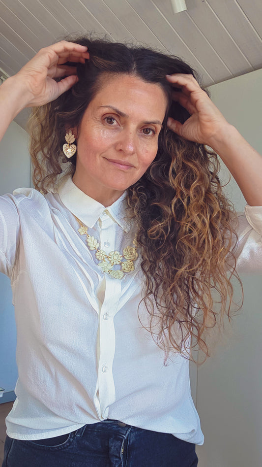 Aros cuore ojos morado con oro