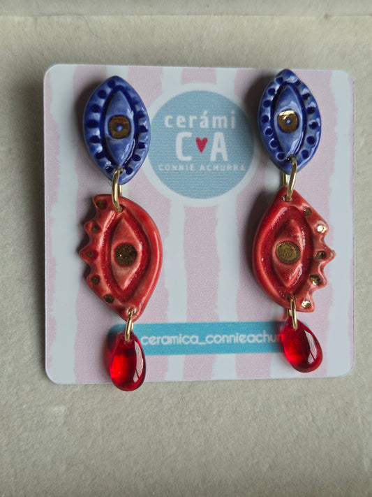 Aros 2 piezas ojos en rojony azul- julio