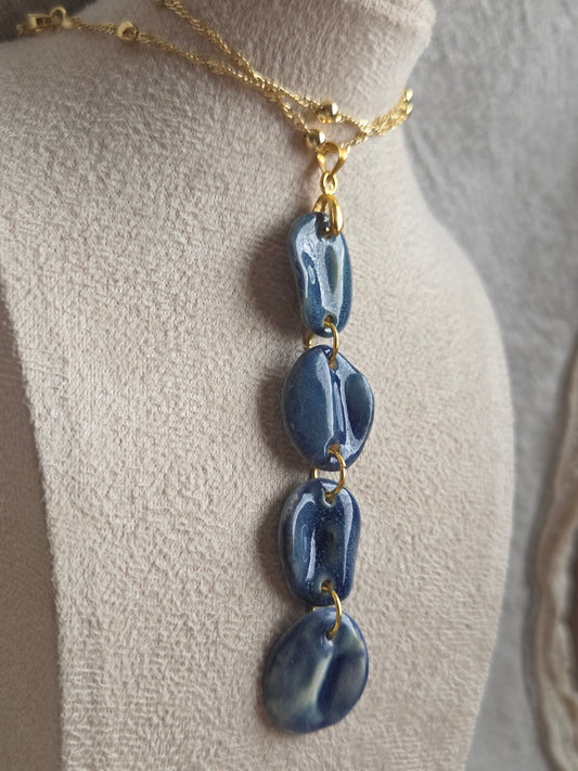 Aros/ Collar pétalos azul mar con cadena de oro, juntos o separados.