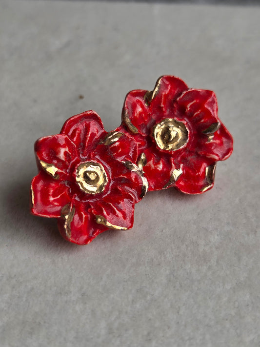 Aros flor roja con oro 1 pieza