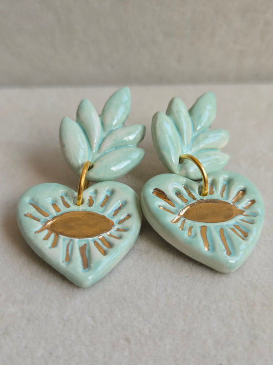 Aros cuore ojos menta con oro