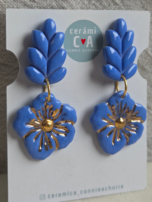 Aros 2 piezas espiga y flor azulino botella con oro