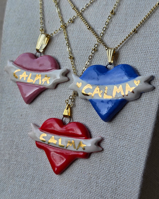 Collar corazón azulino CALMA y oro con cadena bañada en oro