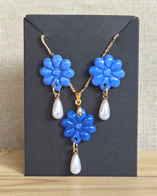 Set flor azulino, aros y collar