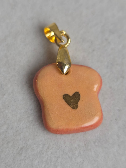 Dije de tostadas con oro