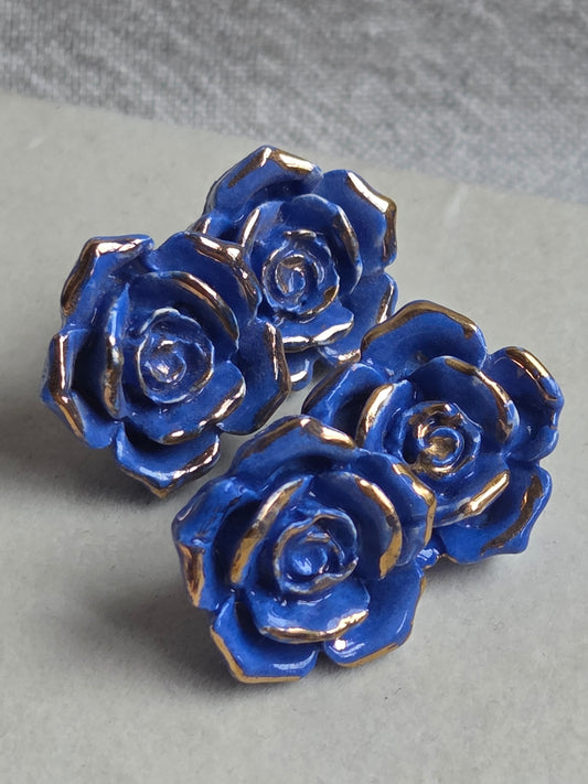Aros Rosas azules 1 pieza con oro