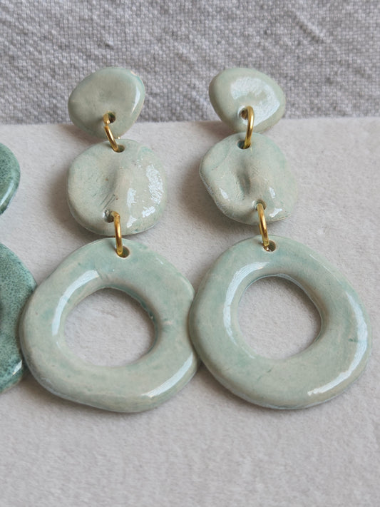 Aros pétalos y círculos L turquesa agua