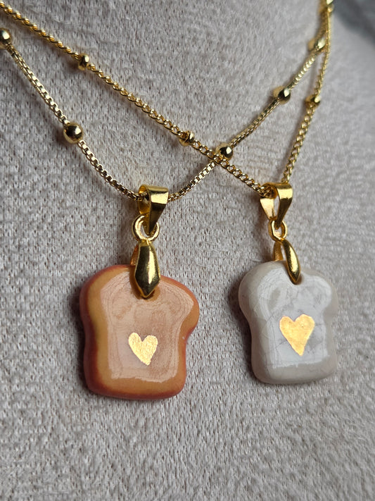 Dije de tostadas con oro