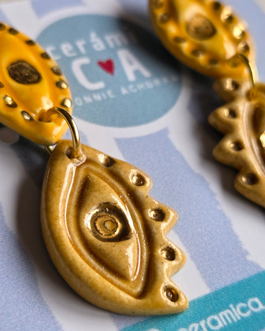 Aros 2 piezas ojos en amarillo- julio