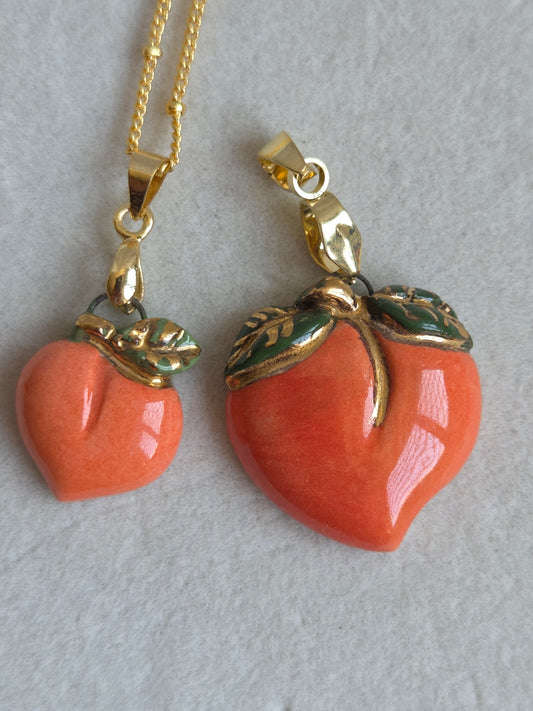 Colgante durazno y oro con cadena